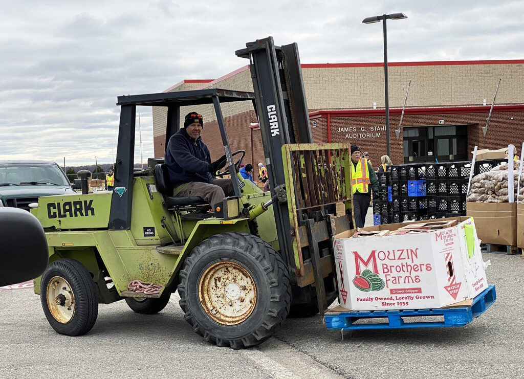 Volunteers Organize Drive-Thru Food Pantries to Support Community Needs Across the Thumb in April