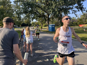 Flossmoor Community Church Volunteers Support Hidden Gem Half Marathon Runners with Water and Encouragement.