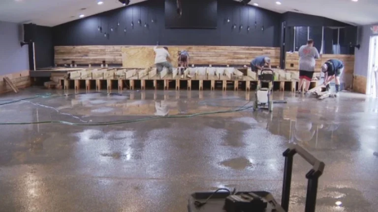 Community members and church members collaborate to clean Vinton County church damaged by flooding