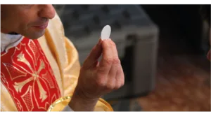 Can a Priest of the Polish National Catholic Church Receive Communion in a Catholic Church?
