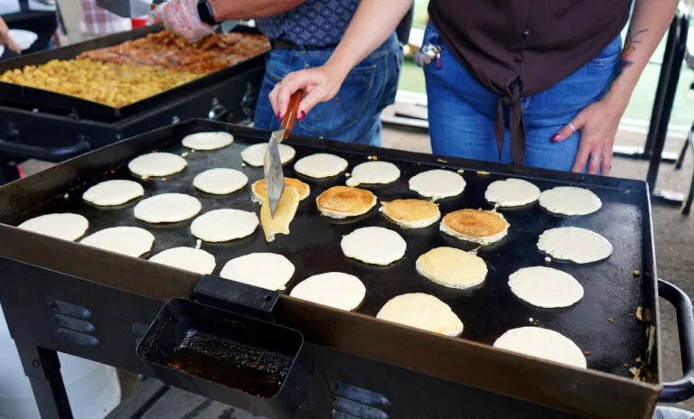 Okotoks Churches Host Stampede Breakfasts to Support Local Food Banks