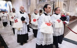 Shortsville Priest Joins Order Charged with Supporting Holy Land