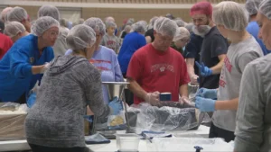Volunteers pack 650,000 meals for global distribution at Feed My Starving Children event