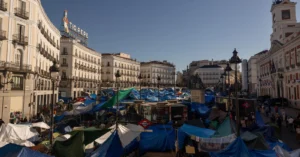 The Puerta del Sol camp shifts focus from protest to shelter for homeless and vulnerable individuals
