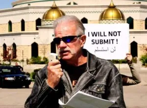Arrest of U.S. Priest Charged with Preparing to Burn 3,000 Quran Copies